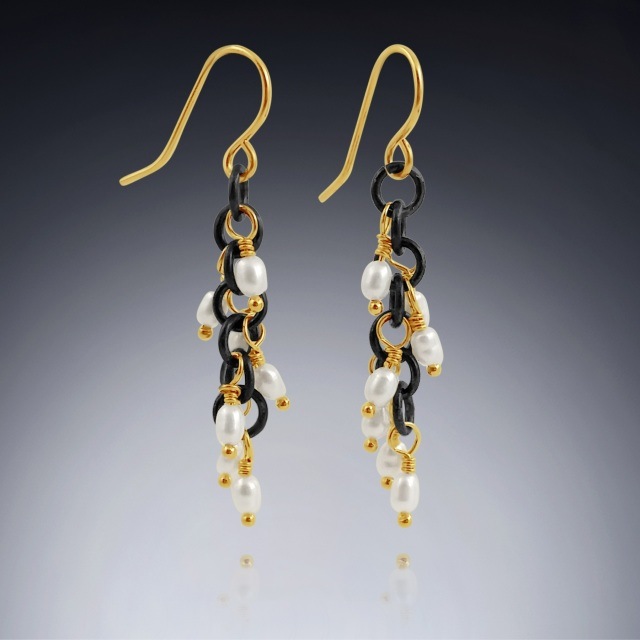 Women's gold spiral earrings with pearls